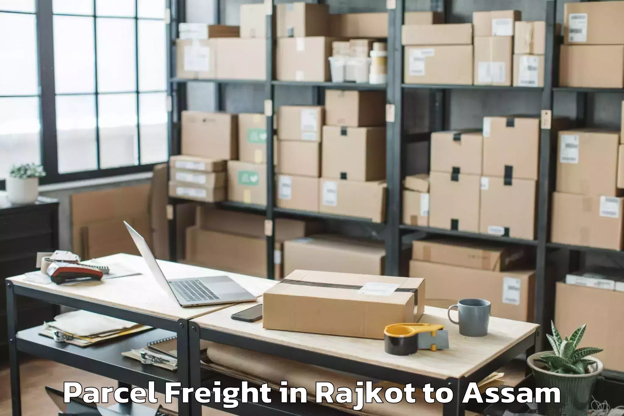 Book Your Rajkot to Lalapur Hailakandi Parcel Freight Today